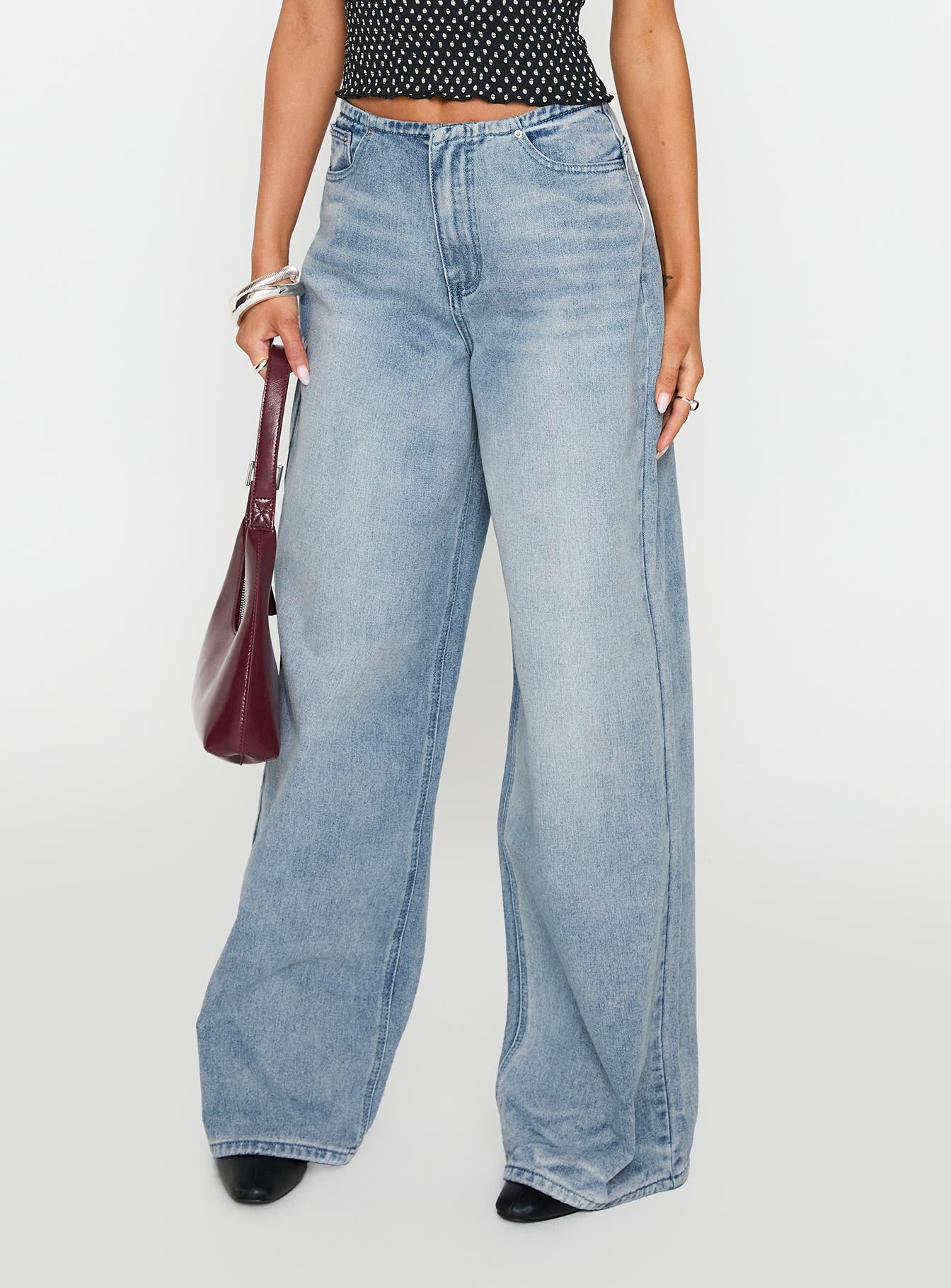 back view of model wearing Princess Polly Bowe Wide Leg Jeans Blue High Waisted 