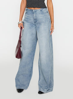 back view of model wearing Princess Polly Bowe Wide Leg Jeans Blue High Waisted 