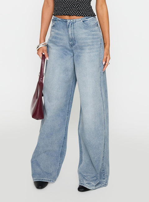 back view of model wearing Princess Polly Bowe Wide Leg Jeans Blue High Waisted 