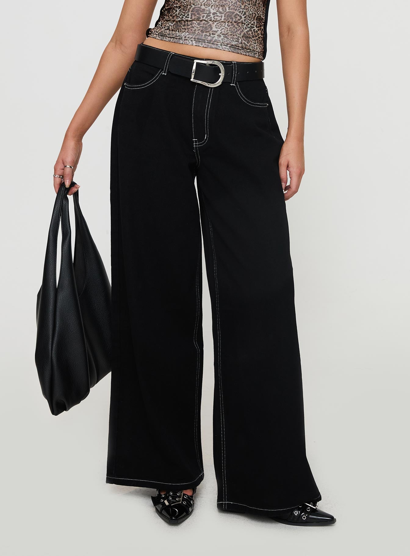 back view of model wearing Princess Polly Naylor Wide Leg Jeans Mid Black High Waisted 