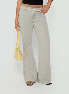 Showcasing the Slow Ride Mid Rise Bootleg Belted Jeans Desert Grey in womens-jeans side view of model wearing Princess Polly