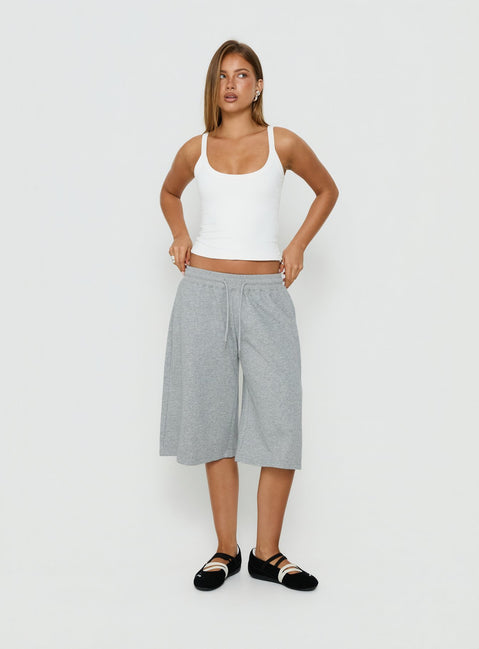 Displaying the Nikko Longline Fleece Shorts Grey Marle in womens regular pants featuring mid-rise waist detail view of model wearing Princess Polly