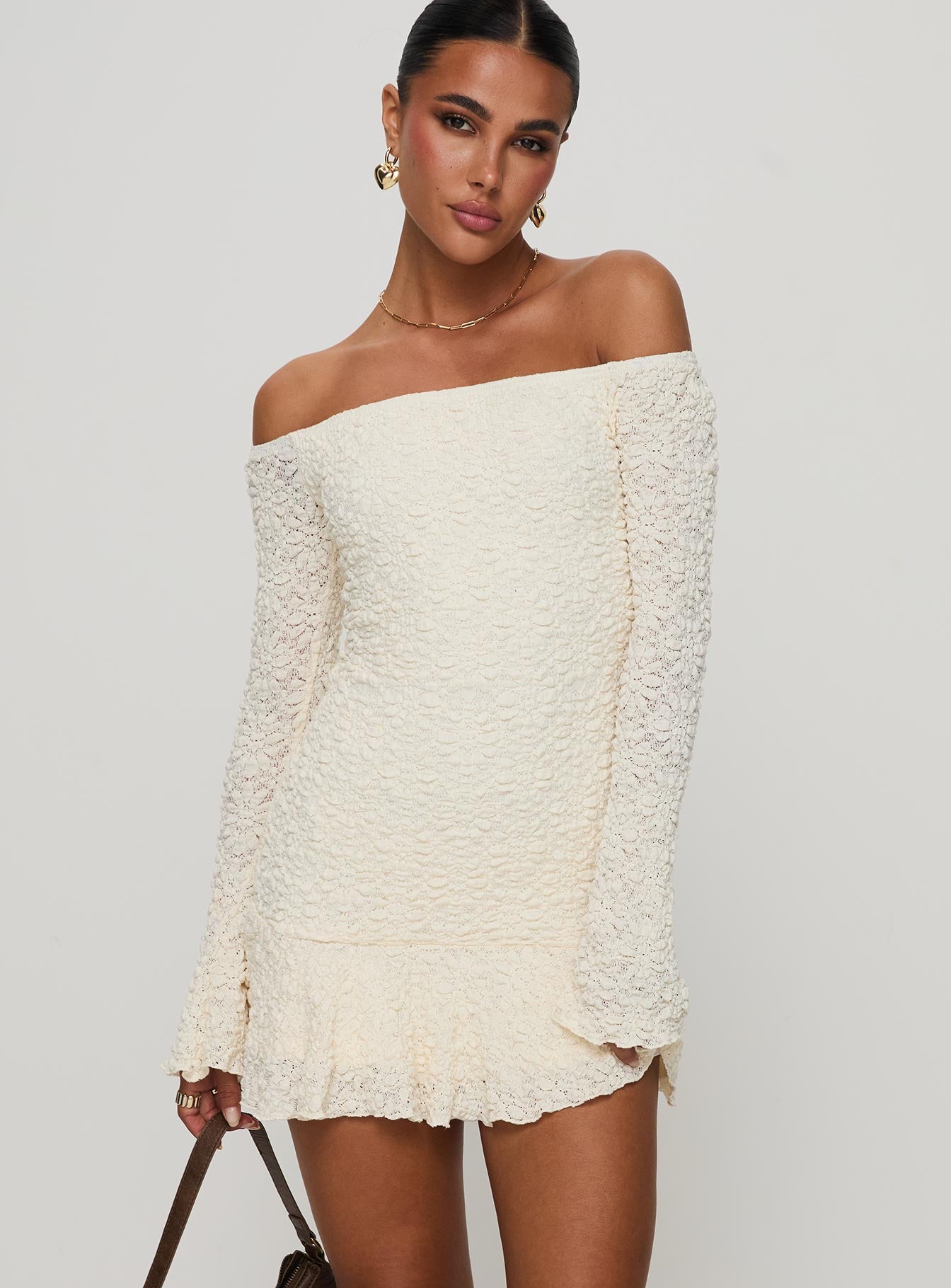 side view of model wearing Princess Polly Vancesca Strapless Mini Dress Cream Straight Neck 