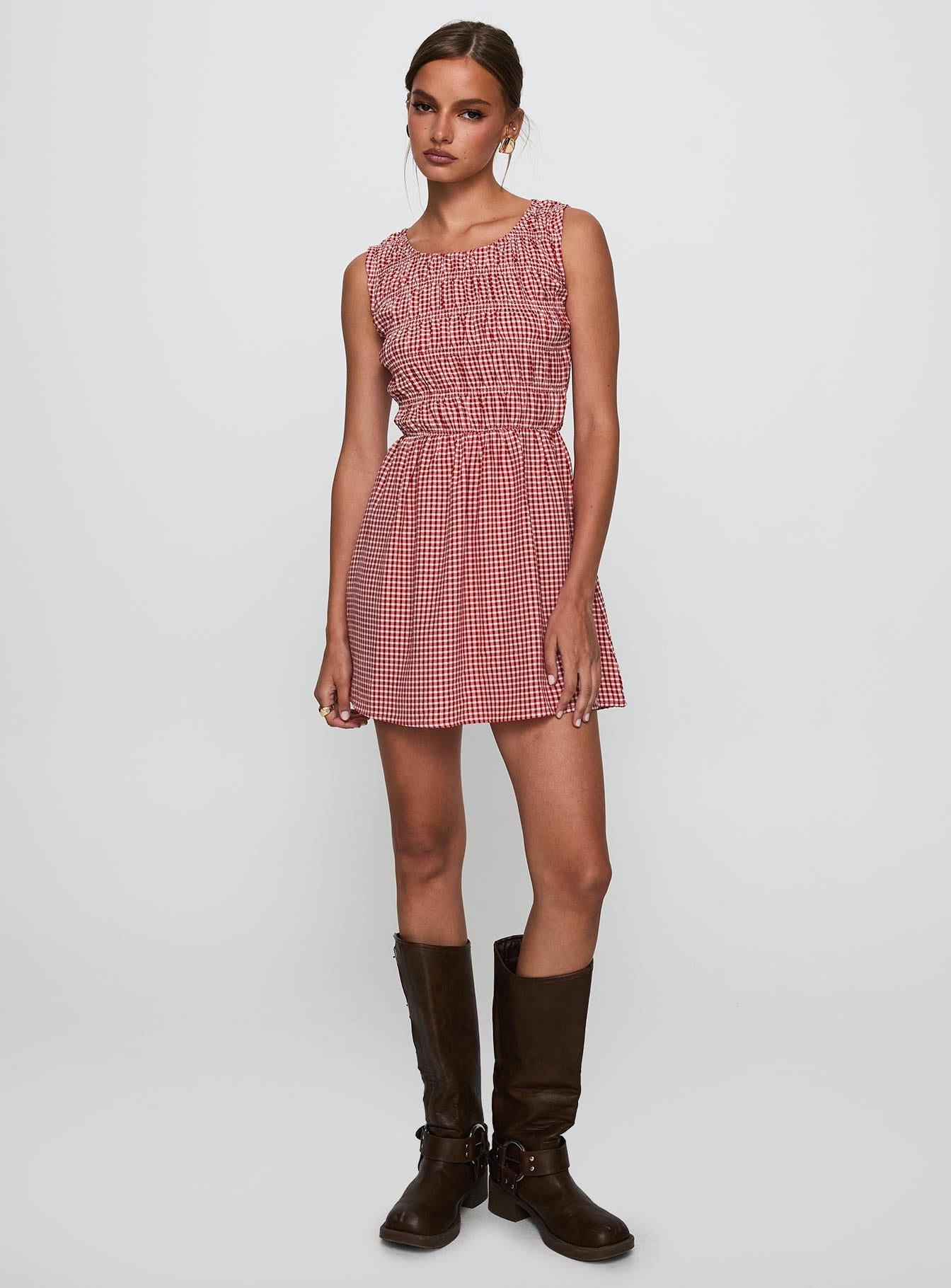 side view of model wearing Princess Polly Winxie Shirred Mini Dress Red Gingham Scoop Neck 
