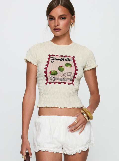 front view of model wearing Princess Polly Ciao Bella Shirred Graphic Top Cream Short Sleeves Crew Neck 