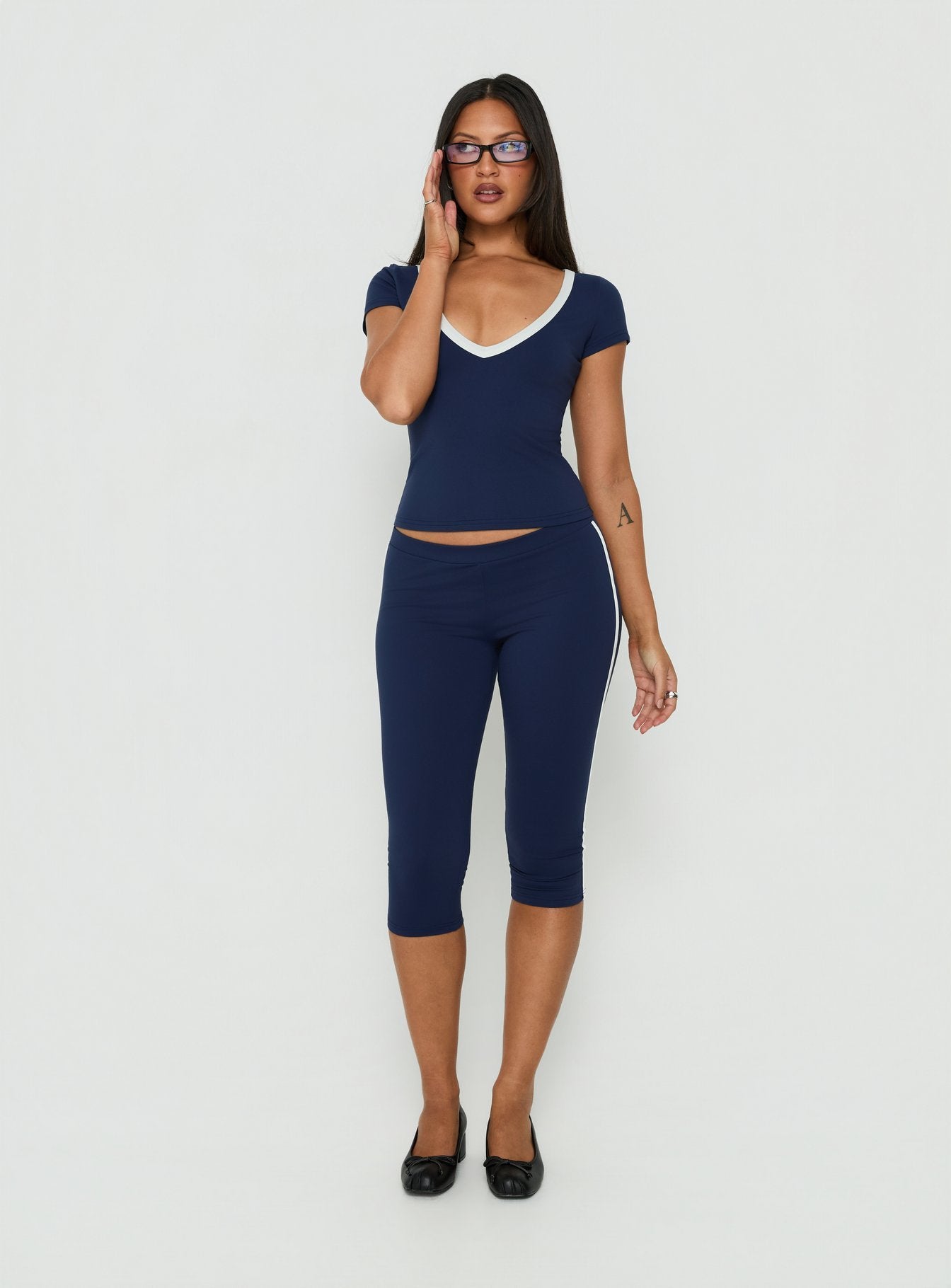Showcasing Rowanna Sporty Capri Pants Navy / Cream womens-regular-pants with high-rise on-body view of model wearing