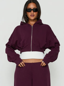 Showcasing the Lanna Fleece Zip Through Cropped Hoodie in Plum, a short womens jumper with oversized fit and hood detail, side view of model wearing Princess Polly