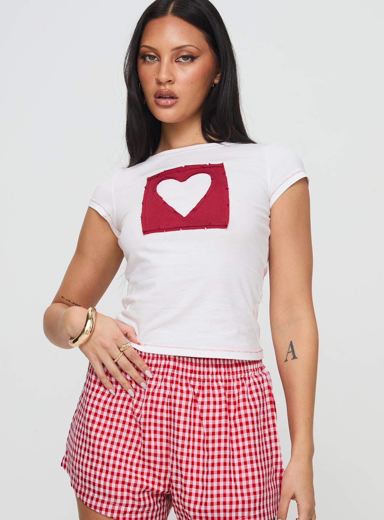 front view of model wearing Princess Polly Were Lovers Baby Tee White Short Sleeves Crew Neck 