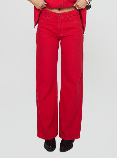front view of model wearing Princess Polly Top Model Jeans Red Mid Rise 