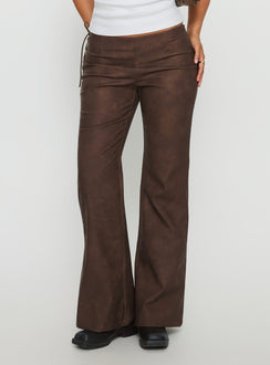 side view of model wearing Princess Polly Trickrider Tie Side Faux Leather Pants Chocolate Mid Rise Pants 