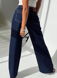 back view of model wearing Princess Polly Darla Low Rise Straight Jean Dark Wash Petite Low Rise Jeans 