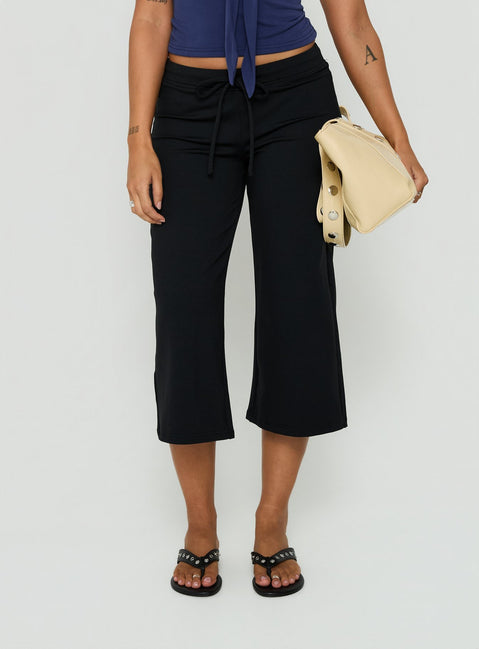 Crafted from Kallora Low Rise Wide Leg Capris Black womens-regular-pants detail view of model wearing Princess Polly