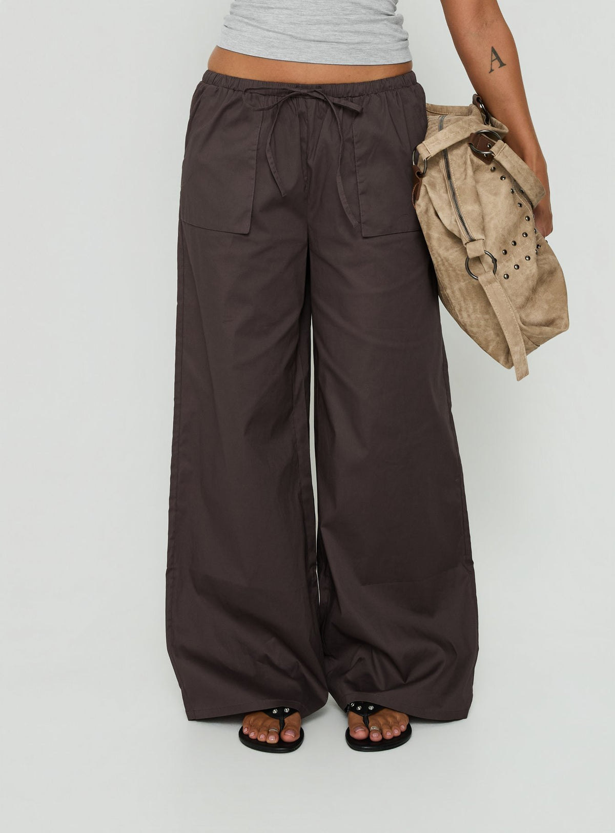 Featuring the Toren Drawstring Straight Leg Pants Charcoal in womens regular pants with high-rise detail Princess Polly