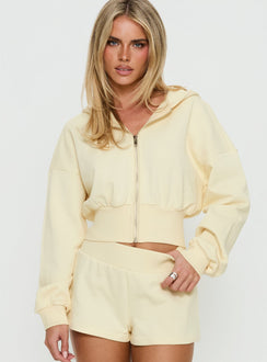 front view of model wearing Princess Polly Daytime Cropped Blouson Hoodie Buttercream Cropped Jumpers 