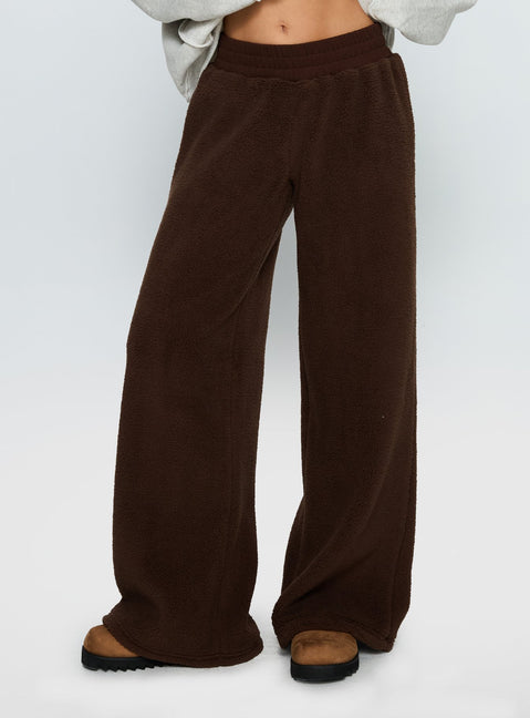 side view of model wearing Princess Polly Siberia Fleece Track Pant Chocolate Brown High Rise Pants 