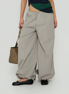 Featuring the Your Orbit Nylon Baggy Pants Grey womens-regular-pants with high-rise side view of model wearing