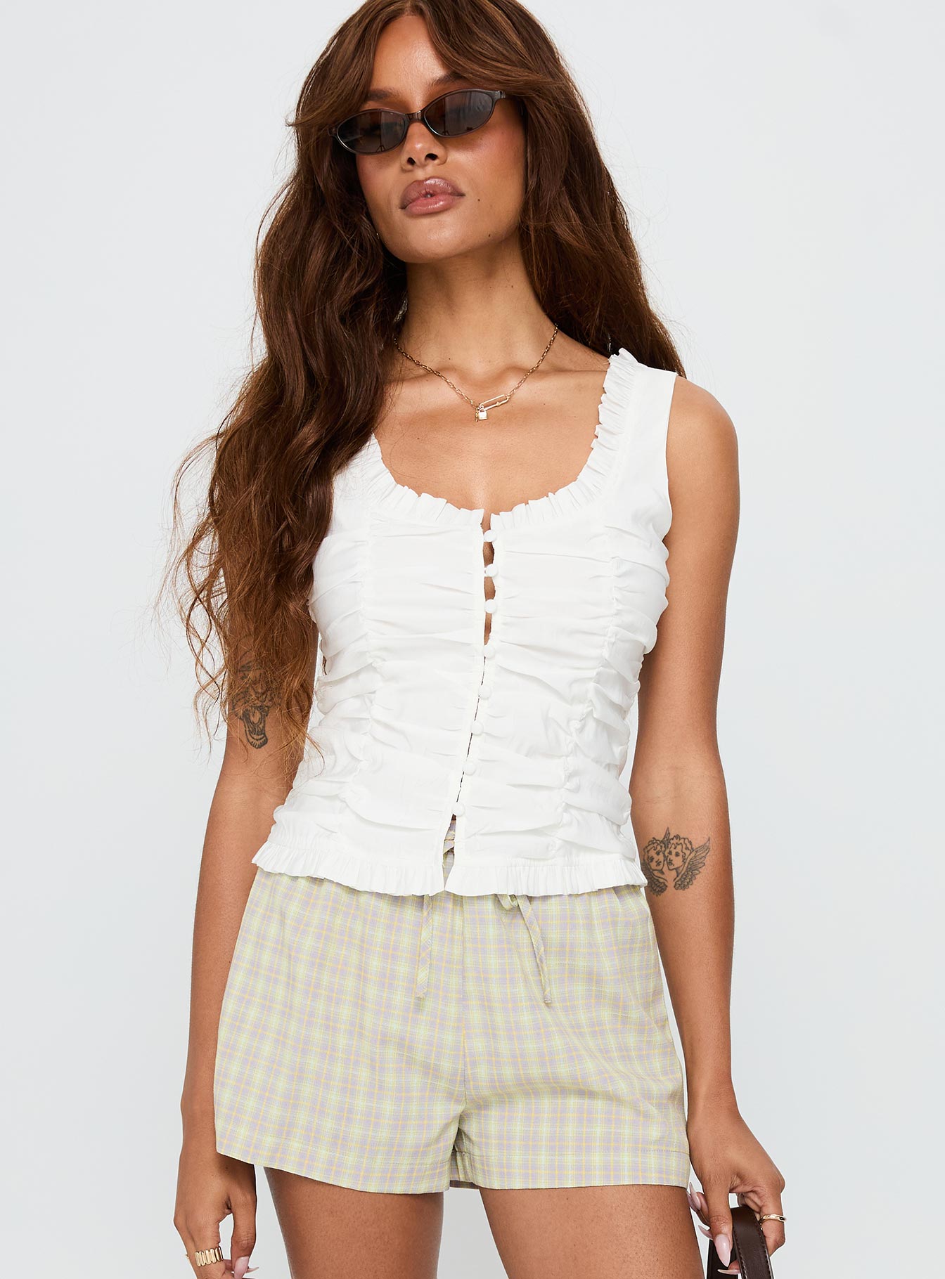 back view of model wearing Princess Polly Almeda Button Up Top White Sleeveless Scoop Neck 
