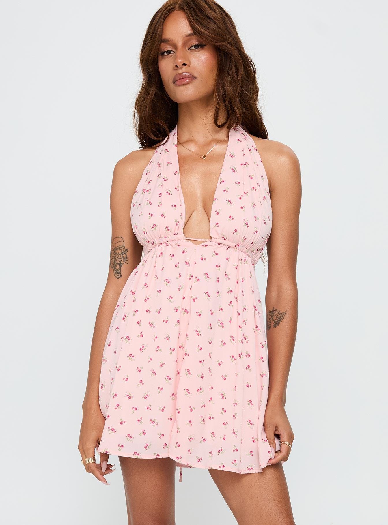 side view of model wearing Princess Polly Saddler Mini Dress Pink Floral Plunger 