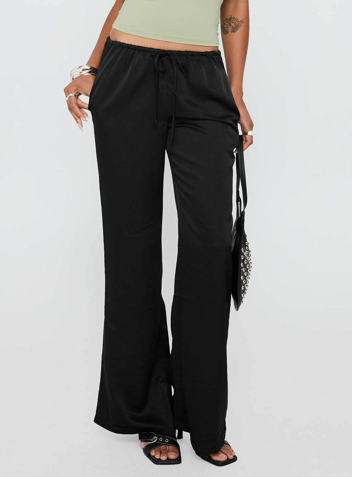 front view of model wearing Princess Polly Vanille Tie Waist Satin Pants Black Low Rise Pants Pants 