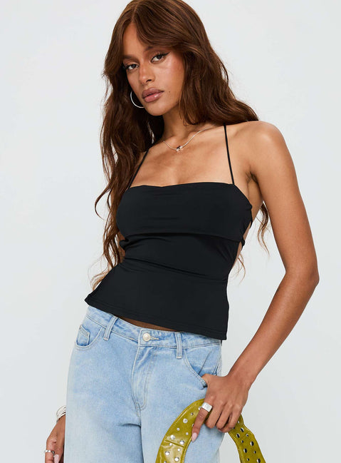side view of model wearing Princess Polly In The End Tie Back Top Black Sleeveless Square Neck 