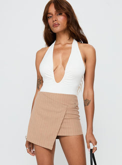   front view of model wearing Princess Polly Strangers Mini Skirt Beige Mini Skirts 