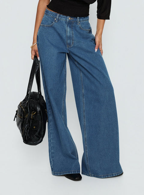 front view of model wearing Princess Polly Naylor Mid Rise Wide Leg Jeans Mid Blue Wash Mid Rise Jeans 