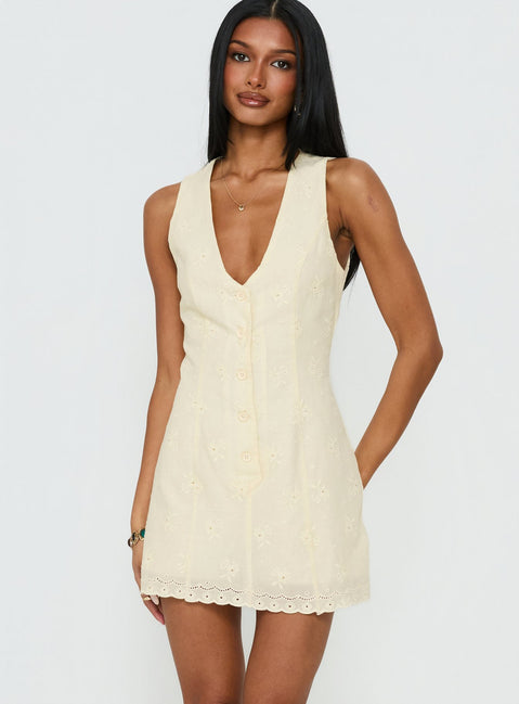 Sylvara Textured Button Up Romper Yellow