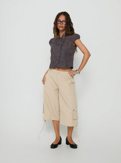 Featuring the Relaxer 3/4 Cargo Pants Beige in womens regular pants with mid-rise front view of model wearing Princess Polly