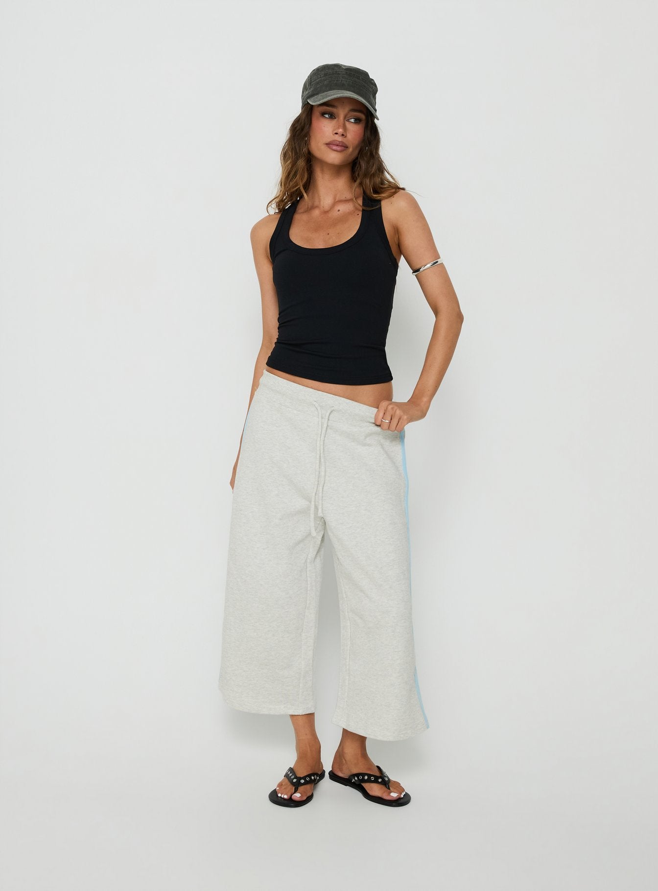 Showcasing the Dojo 3/4 Track Pants Grey Marle in womens regular pants with mid-rise front view of model wearing Princess Polly