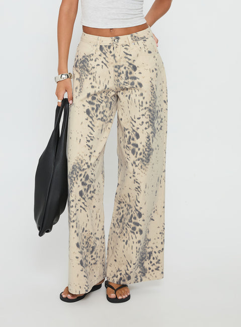 back view of model wearing Princess Polly Naylor Mid Rise Wide Leg Jeans Animal Spot Mid Rise Jeans 