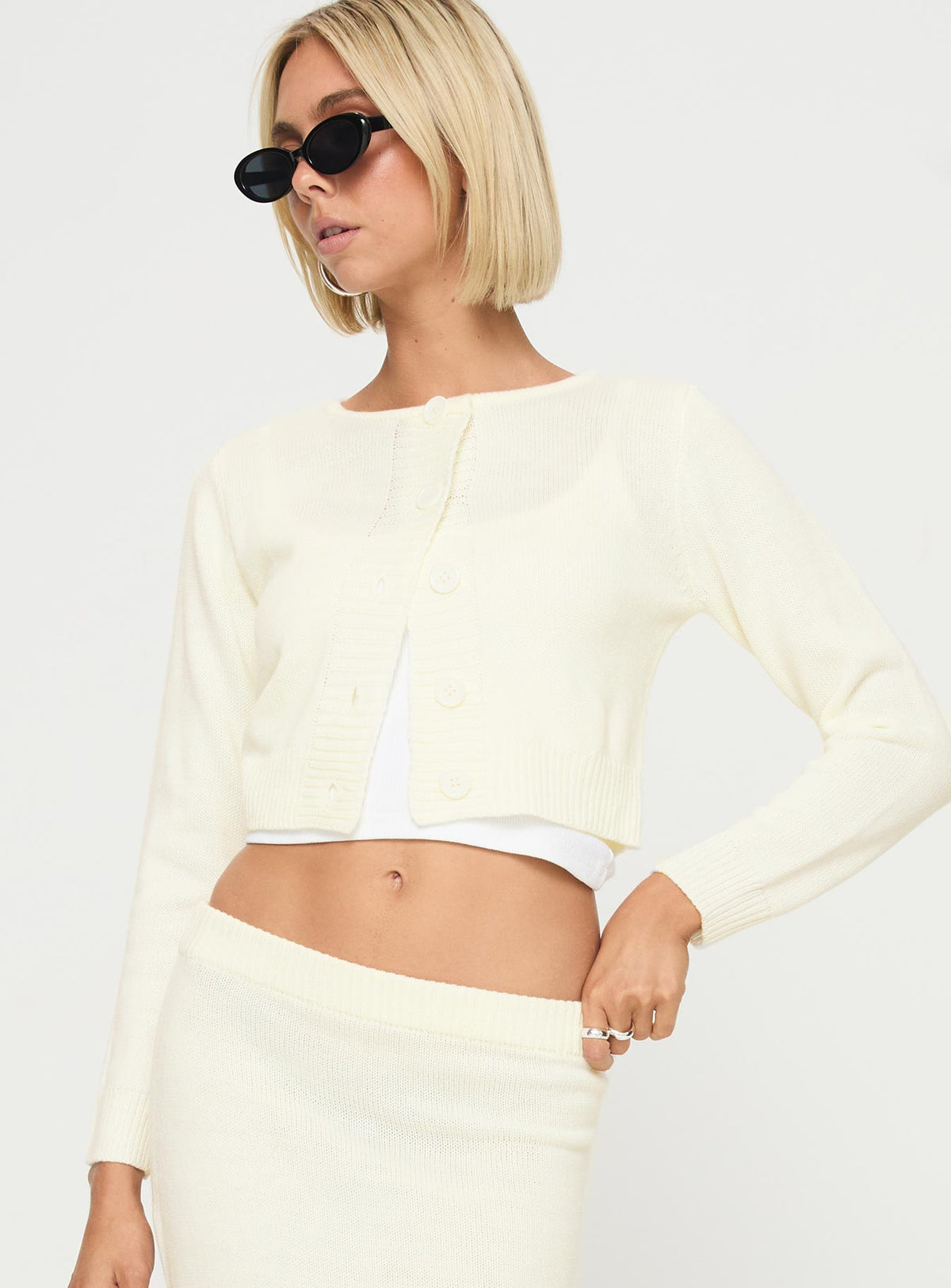front view of model wearing Princess Polly Collase Knit Sweater Cream cropped 