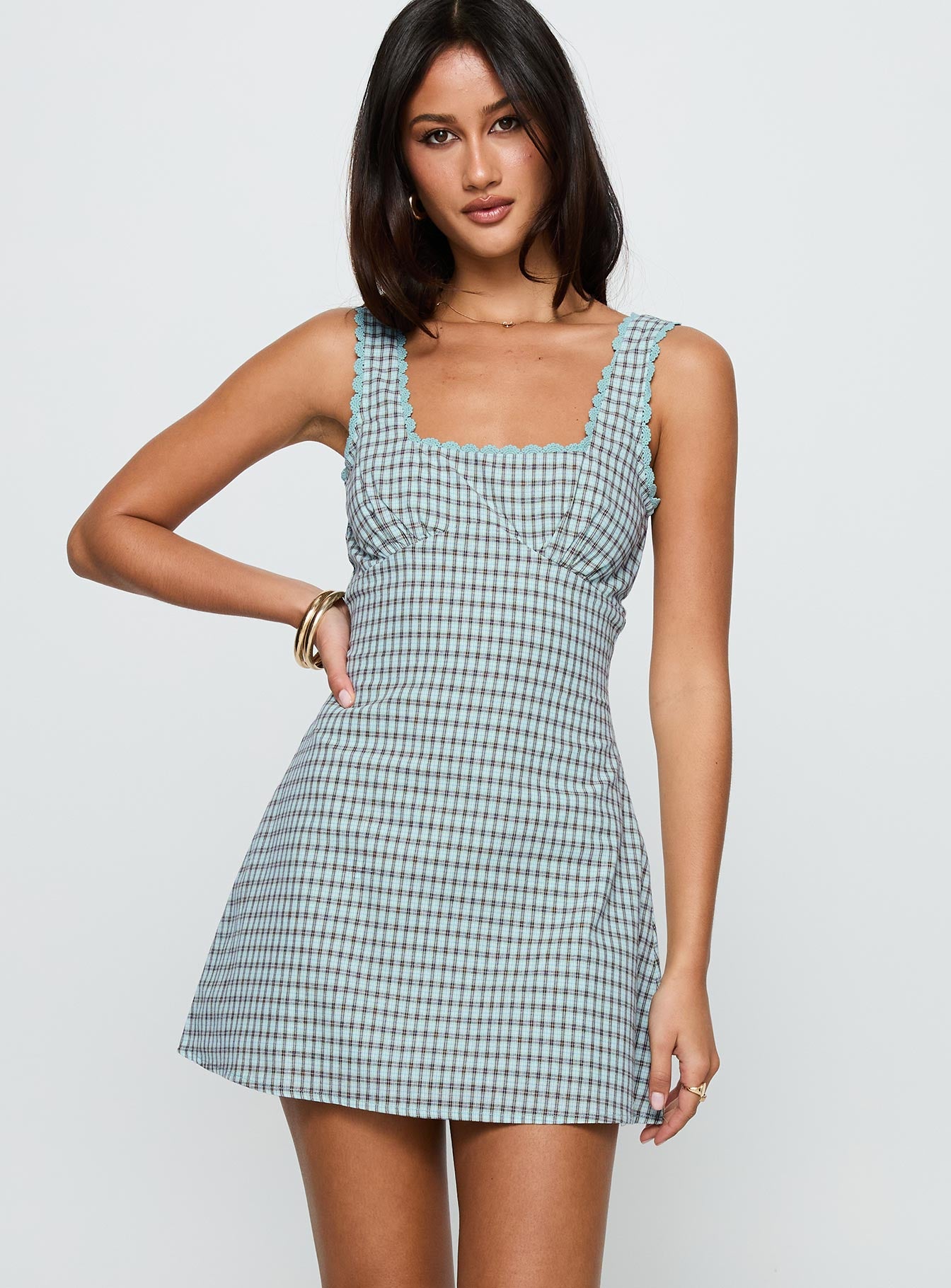 front view of model wearing Princess Polly Dasha Mini Dress Blue / Brown Check Square Neck 