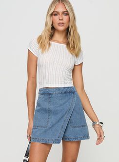 front view of model wearing Princess Polly Bentiez Denim Skort Mid Wash High Waisted Shorts 