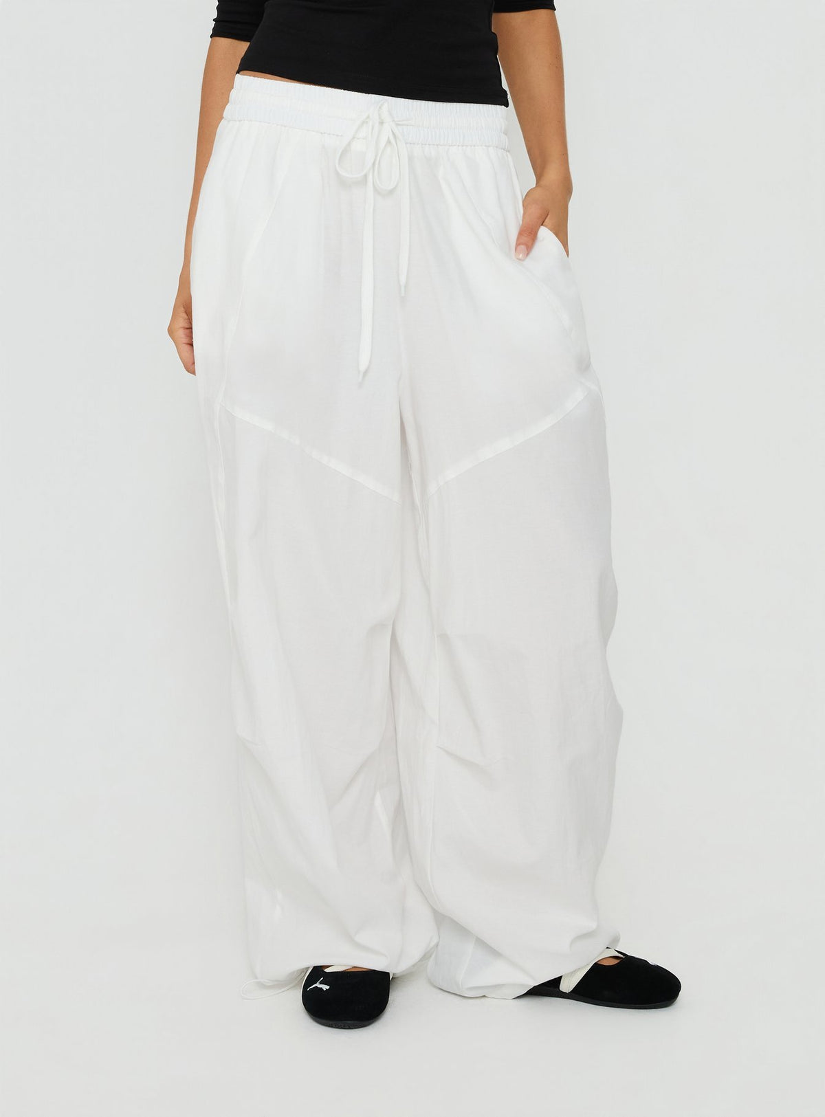 Featuring Mankind Baggy Cargo Pants White in womens-regular-pants with mid-rise, detail view of model wearing Princess Polly