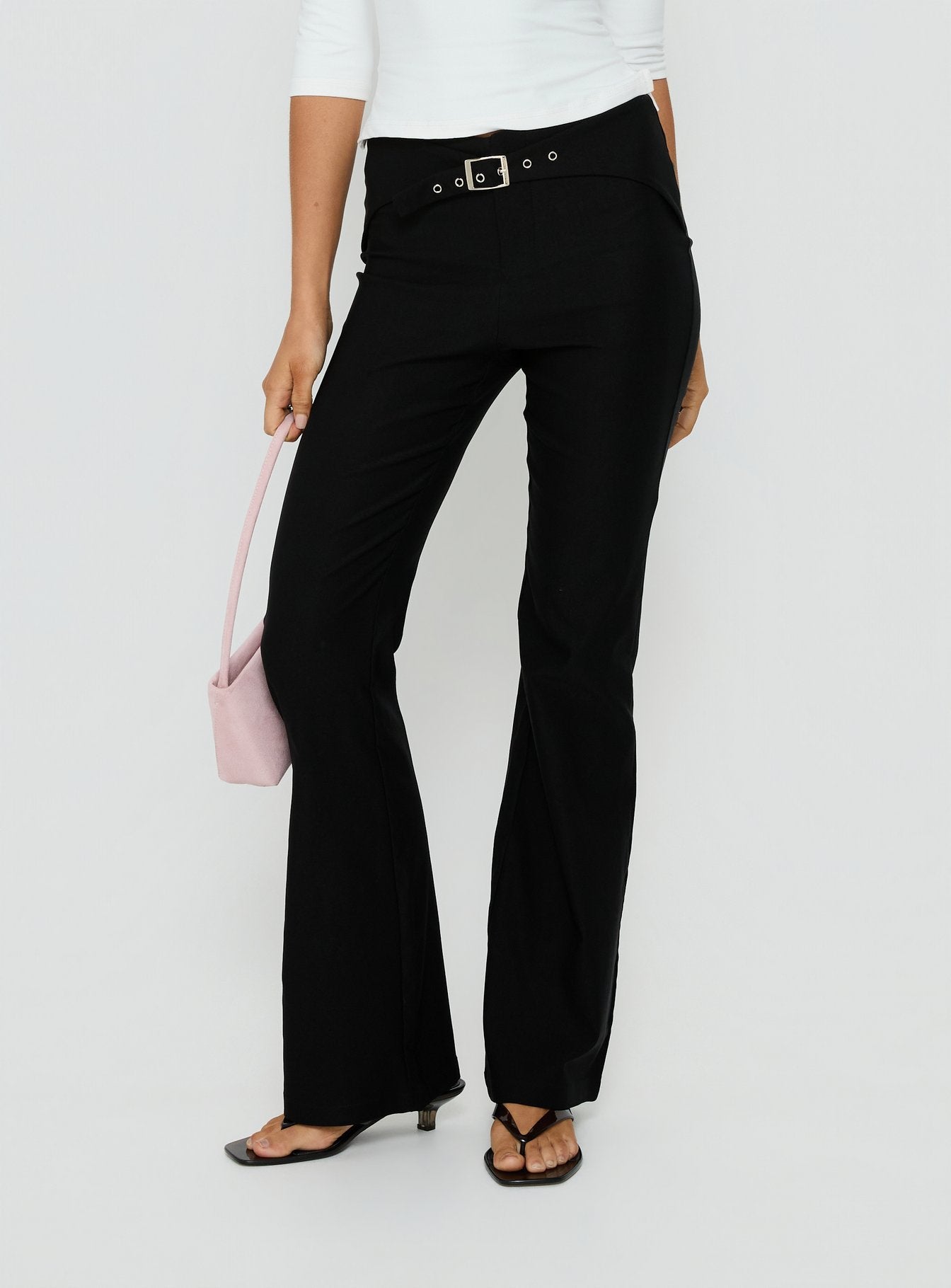 Crafted with the Viridian Belted Flared Pants Black womens-regular-pants in high-rise front view of model wearing Princess Polly