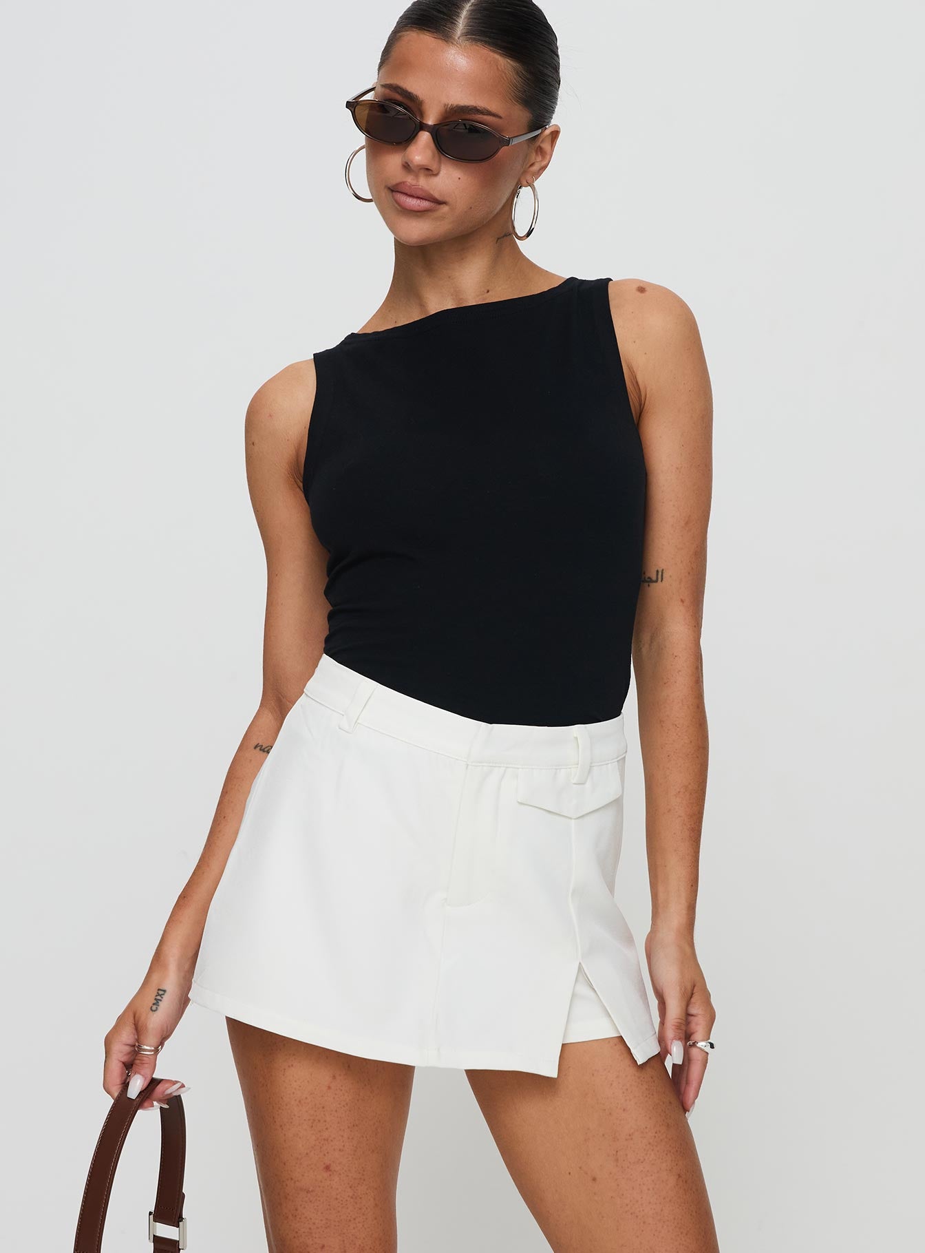 front view of model wearing Princess Polly Deuce Split Skort White High Waisted Shorts 