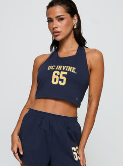 side view of model wearing Princess Polly UC Irvine Tailgate Halter Top Blue Sleeveless Scoop Neck 