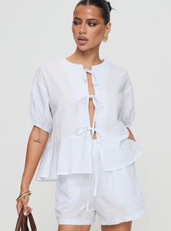 front view of model wearing Princess Polly Sunblind Top White Half Sleeves Crew Neck 