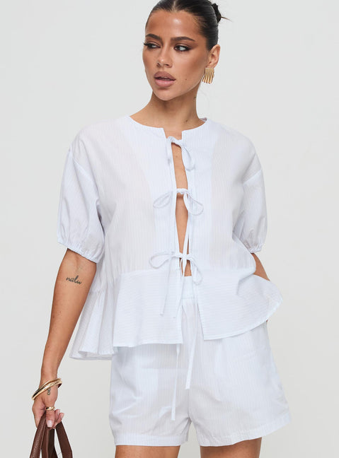 front view of model wearing Princess Polly Sunblind Top White Half Sleeves Crew Neck 