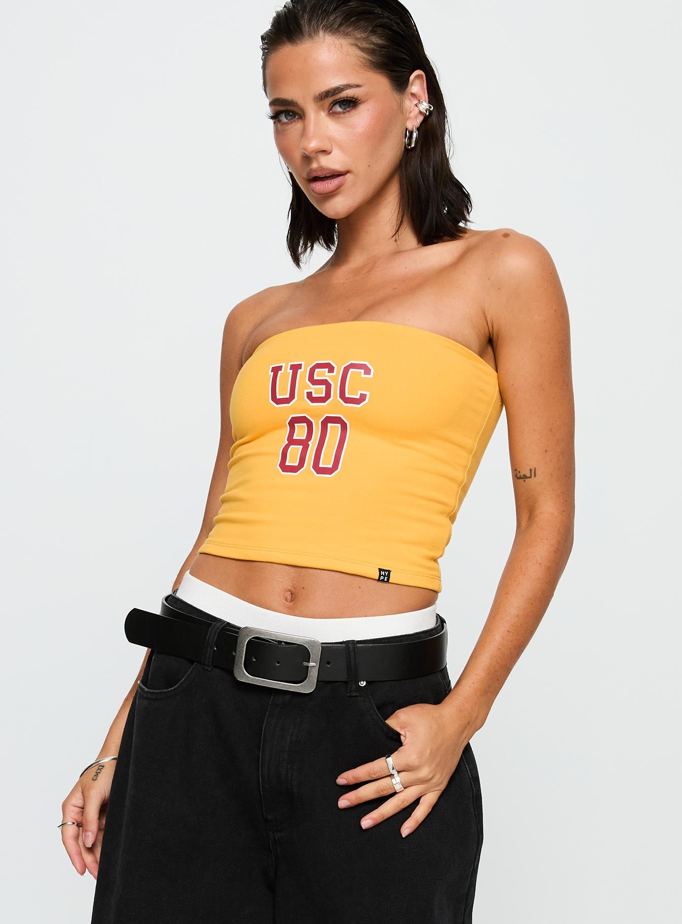 side view of model wearing Princess Polly USC Tube Top Gold Sleeveless straight 