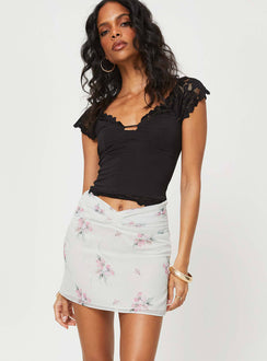 Front view of model wearing  front Perrin Mini Skirt Cream Princess Polly  Mini Skirts 