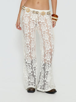 back view of model wearing Princess Polly Rosadonna Lace Flare Pants Cream Mid Rise Pants 