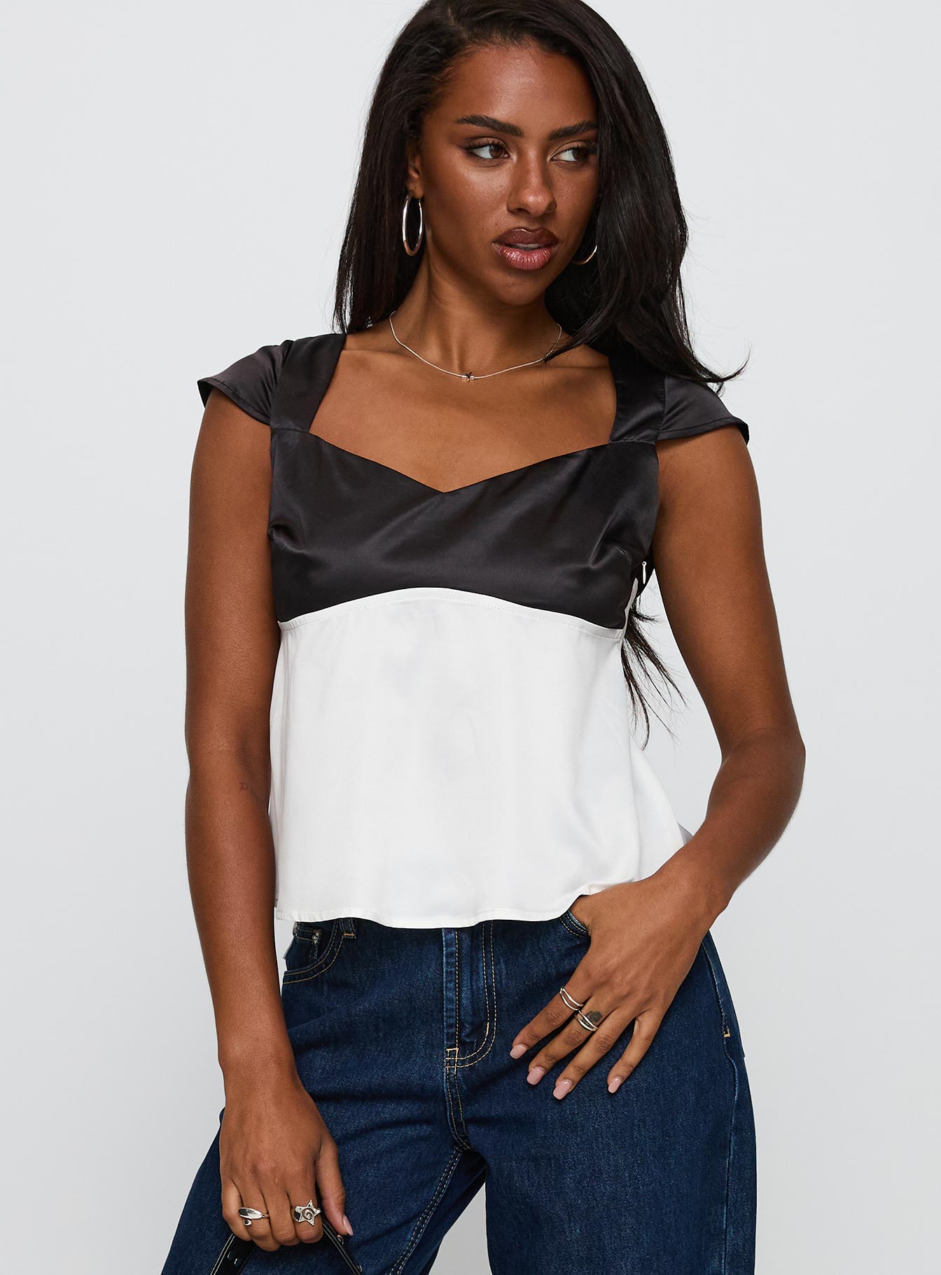 front view of model wearing Princess Polly Think About It Cap Sleeve Top Black / White Short Sleeves V-Neck 