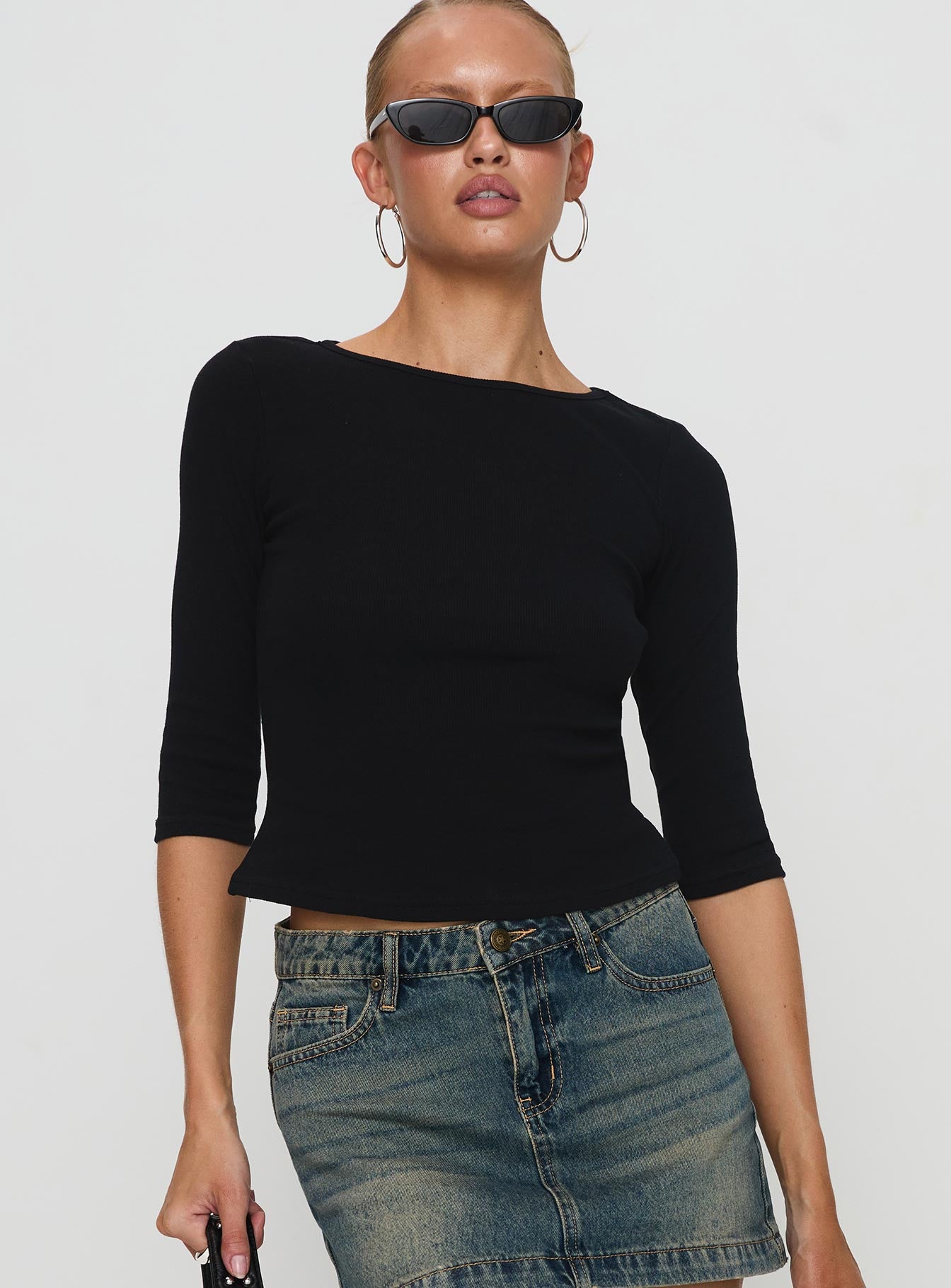 front view of model wearing Princess Polly Elaia 3/4 Sleeve Top Black Three Fourth Sleeves Crew Neck 