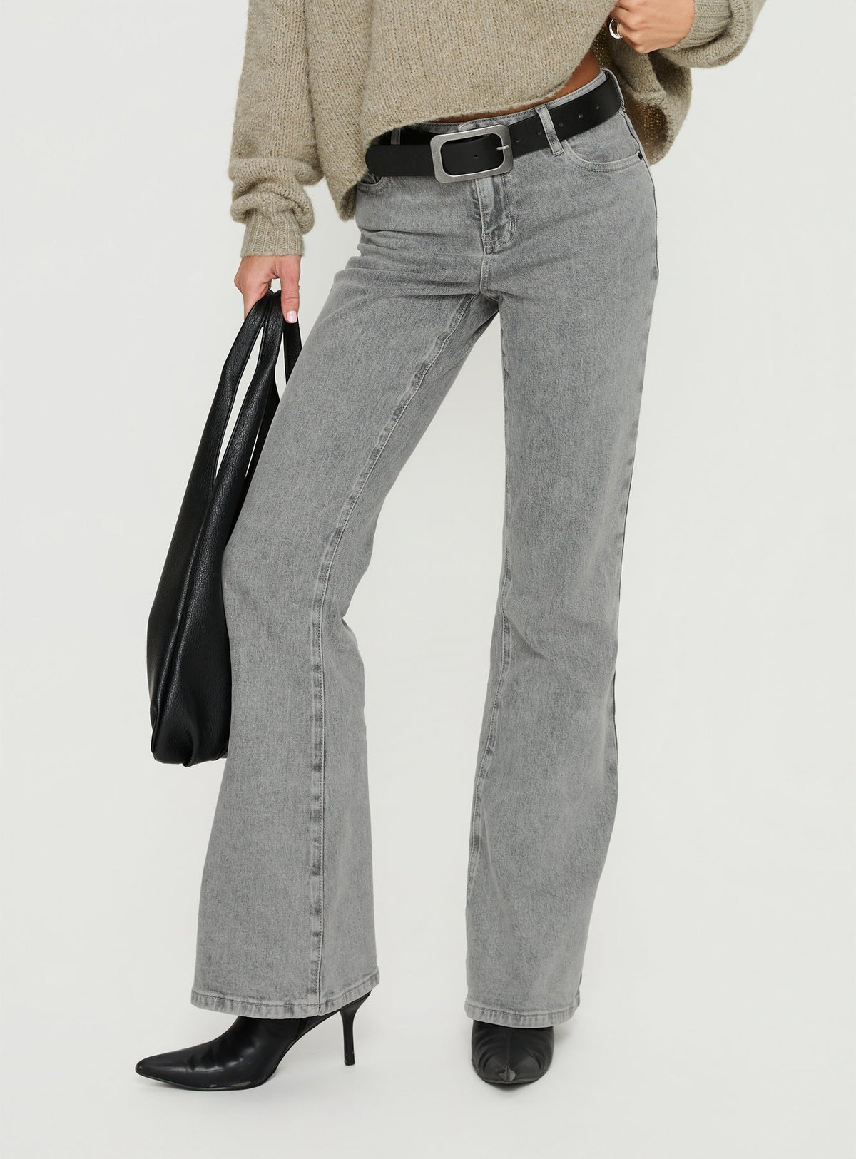 back view of model wearing Princess Polly Magic Mirror Mid Rise Bootleg Jeans Washed Grey Mid Rise Jeans Jeans 