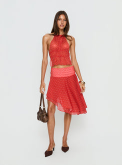   side view of model wearing Princess Polly Legacy Midi Skirt Tomato Polka 