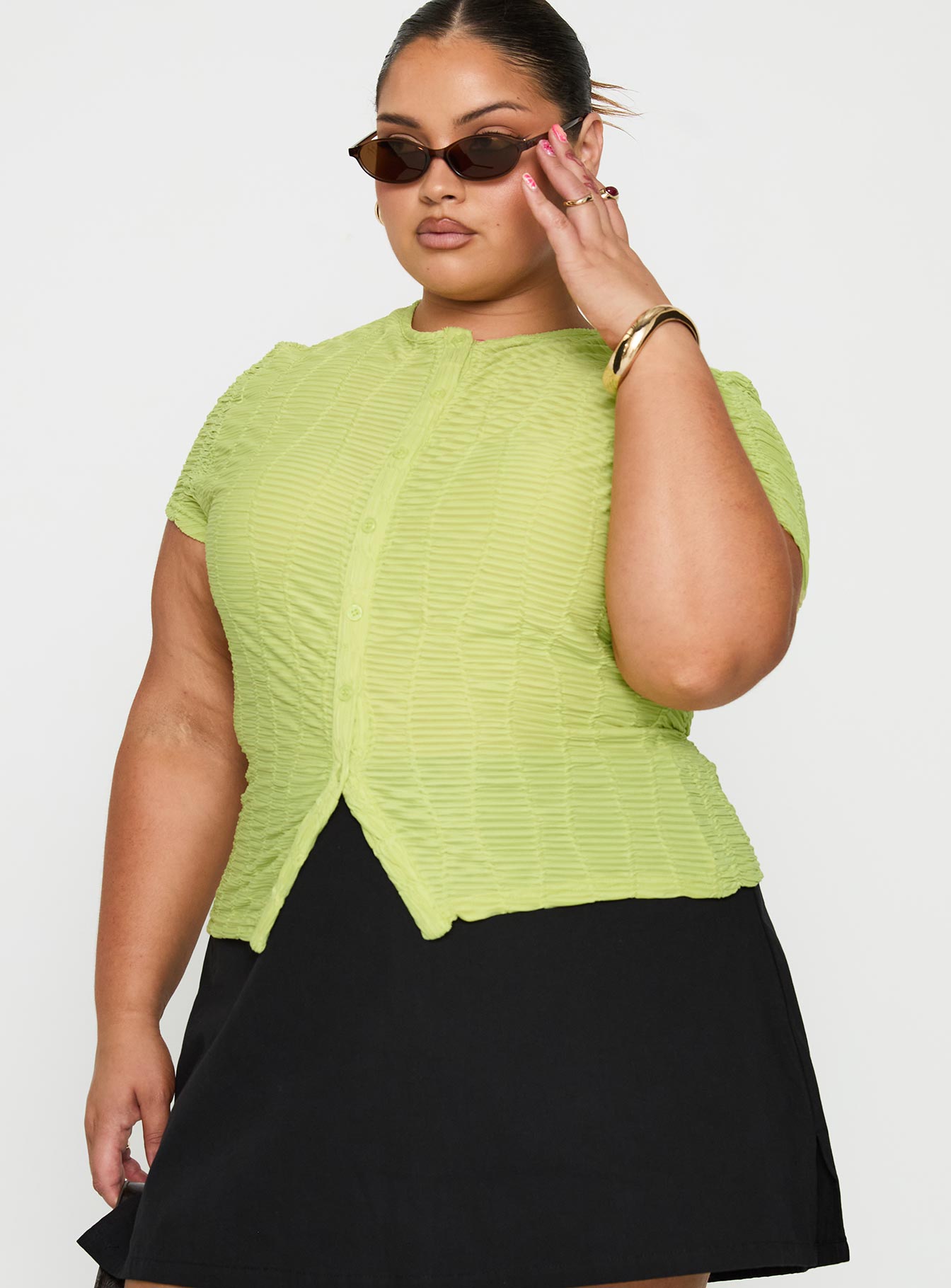 side view of model wearing Princess Polly Suzu Textured Top Green Curve Short Sleeves Crew Neck 