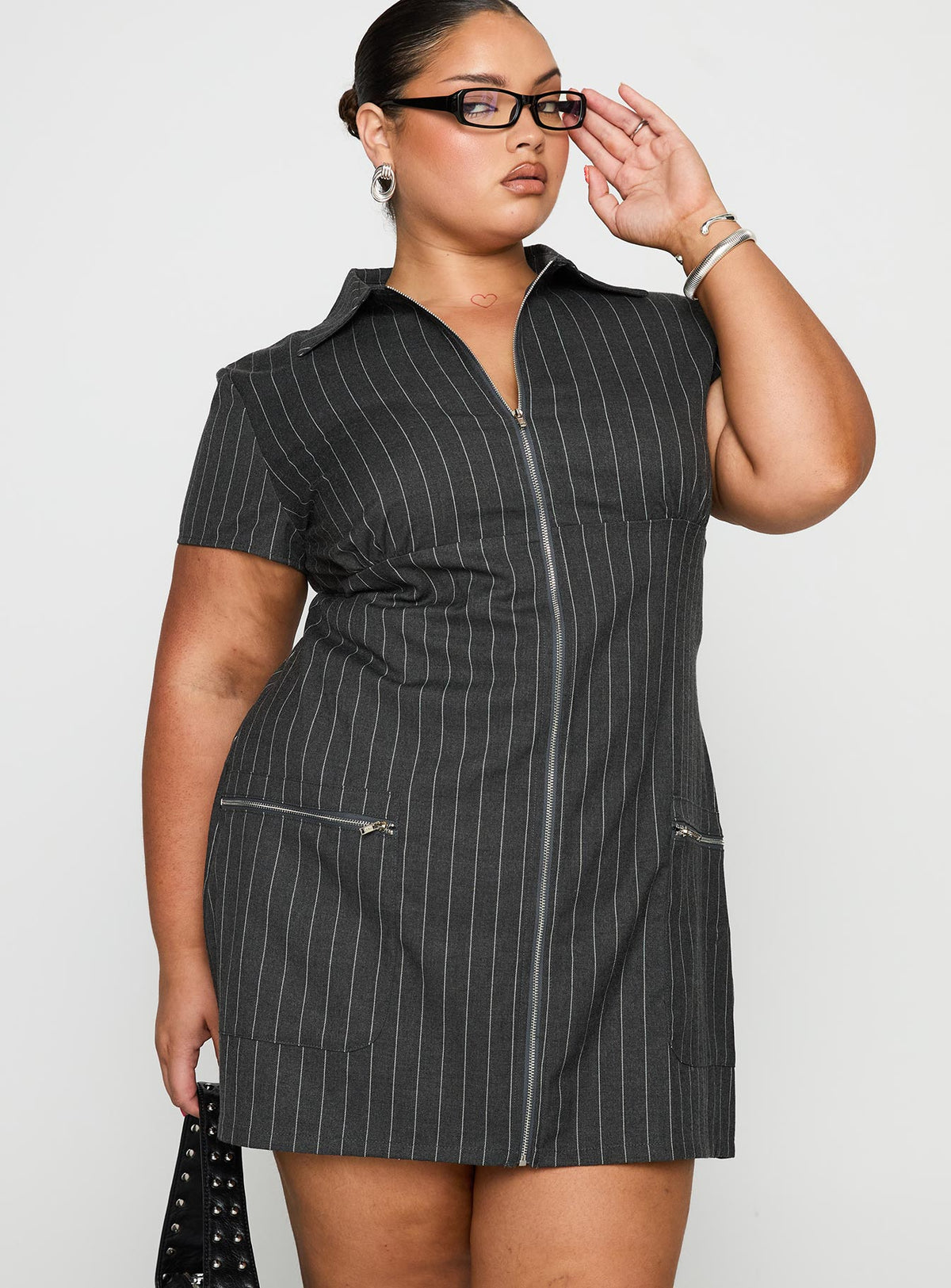 back view of model wearing Princess Polly Wynona Mini Dress White / Grey Pinstripe Curve V-Neck 