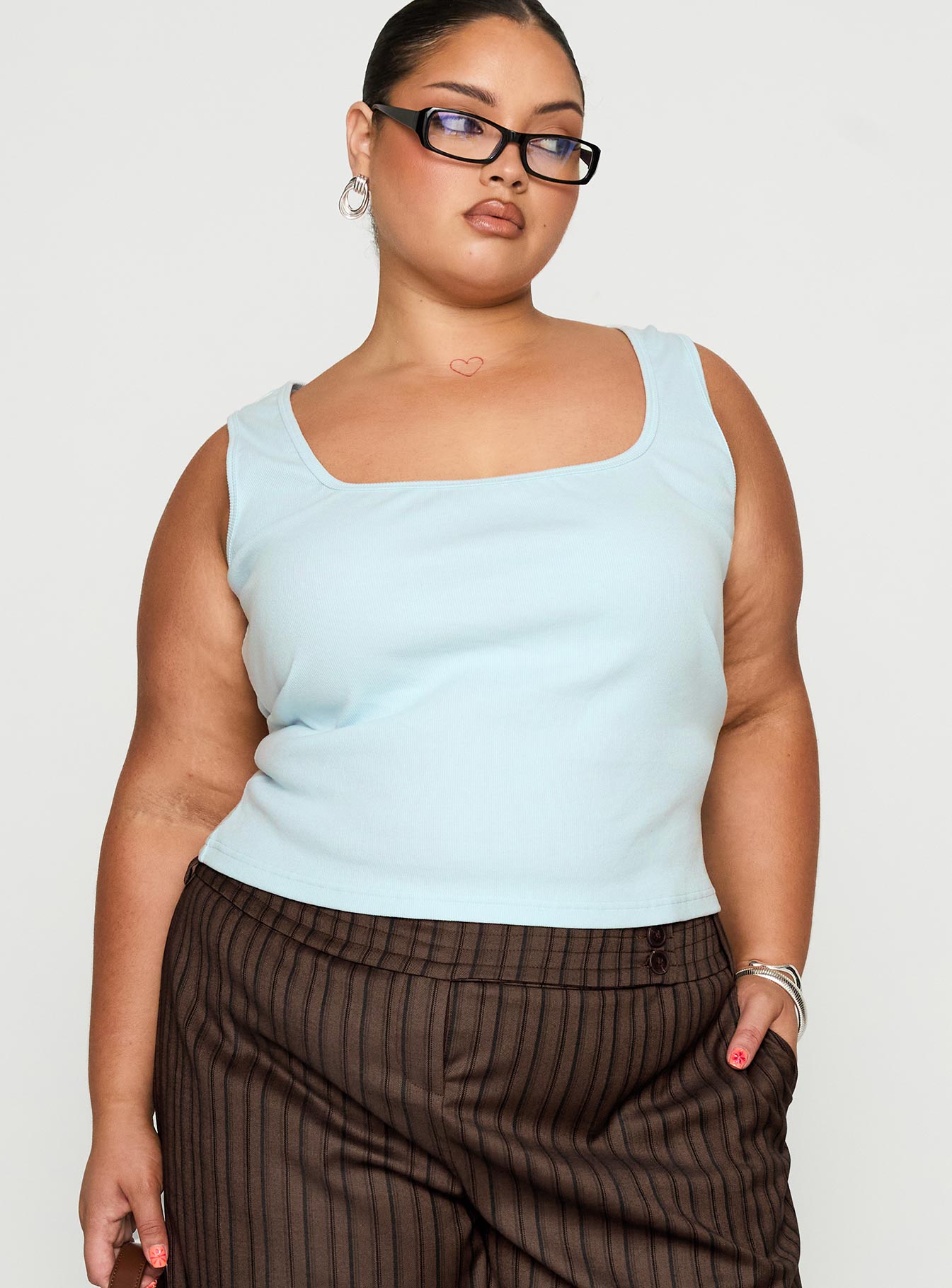 front view of model wearing Princess Polly Baseline Square Neck Rib Tank Top Light Blue Curve Sleeveless Square Neck 