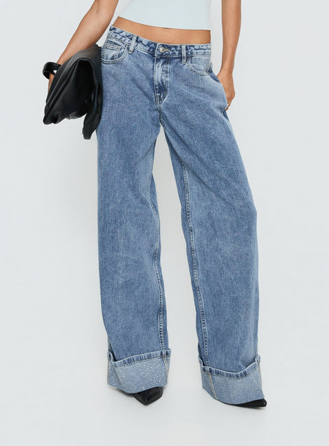front view of model wearing Princess Polly Ramos Diamante Low Rise Wide Leg Jeans Washed Mid Blue Low Rise Jeans 
